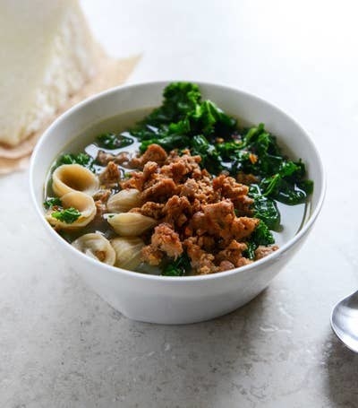 Spicy Sausage, Kale, and Orecchiette Soup in a bowl