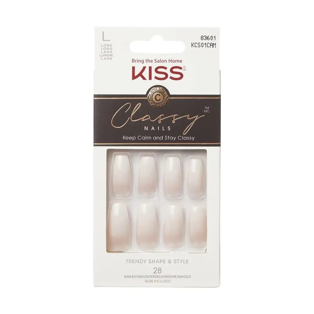 A box of Kiss acrylic nails in a light pink color that ombres into a slightly lighter color towards the end.