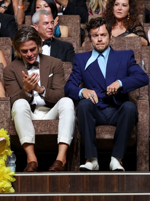 chris pine and harry sitting next to each other