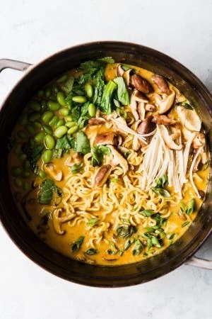 Coconut Curry Ramen cooking in a pan