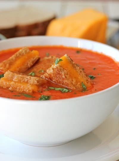 Tomato Soup With Grilled Cheese Croutons in a bowl