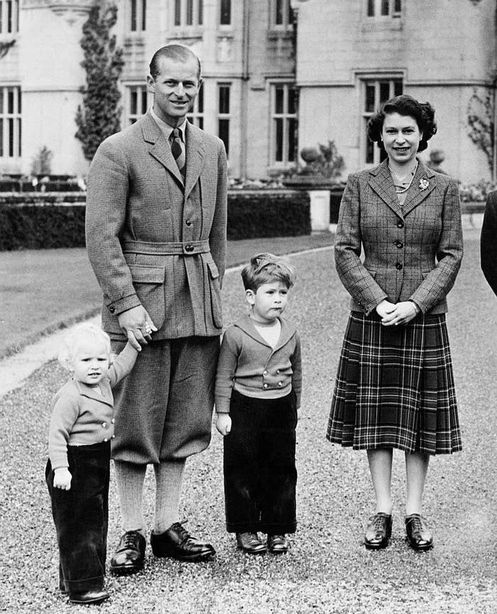 A black-and-white photo of Elizabeth with her husband and two of their young children