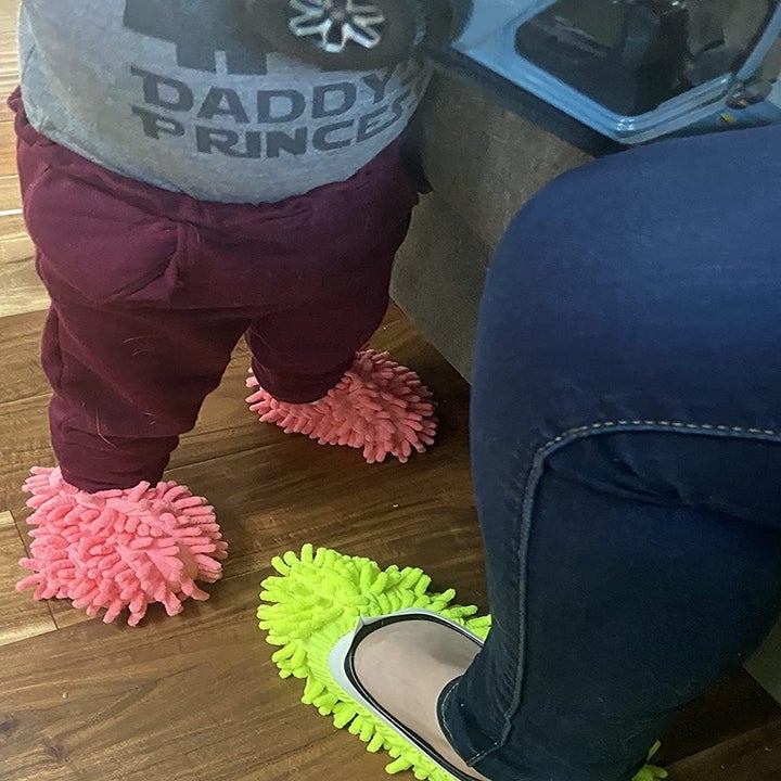 A reviewer and their toddler in the slippers
