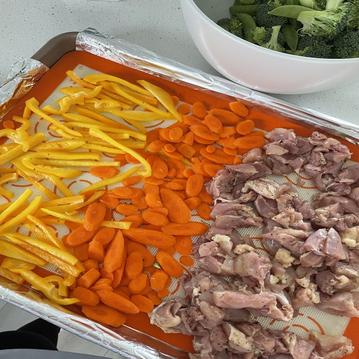 veggies and chicken on a sheet pan