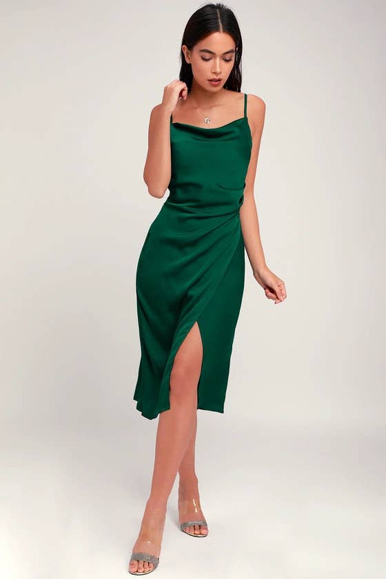 Model wearing the forest green dress