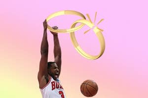 A man dunks a basketball through two linked wedding rings