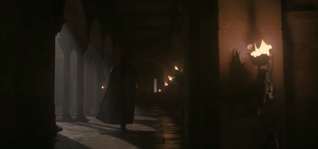 The Kingsguard knight walks down a corridor in the Red Keep