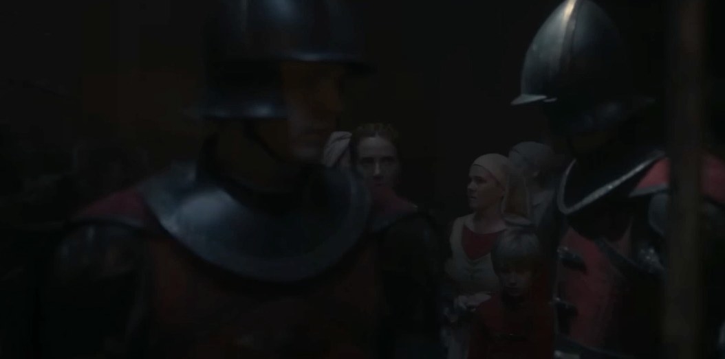 Castle guards lead servants into the dungeons