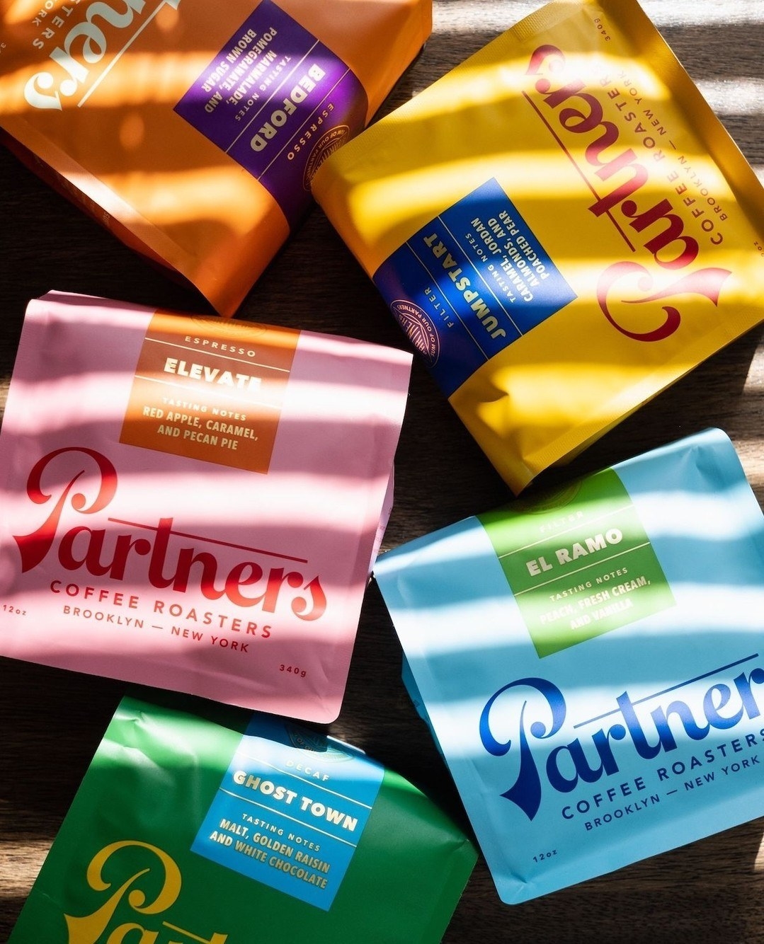 five different bags of Partners Coffee