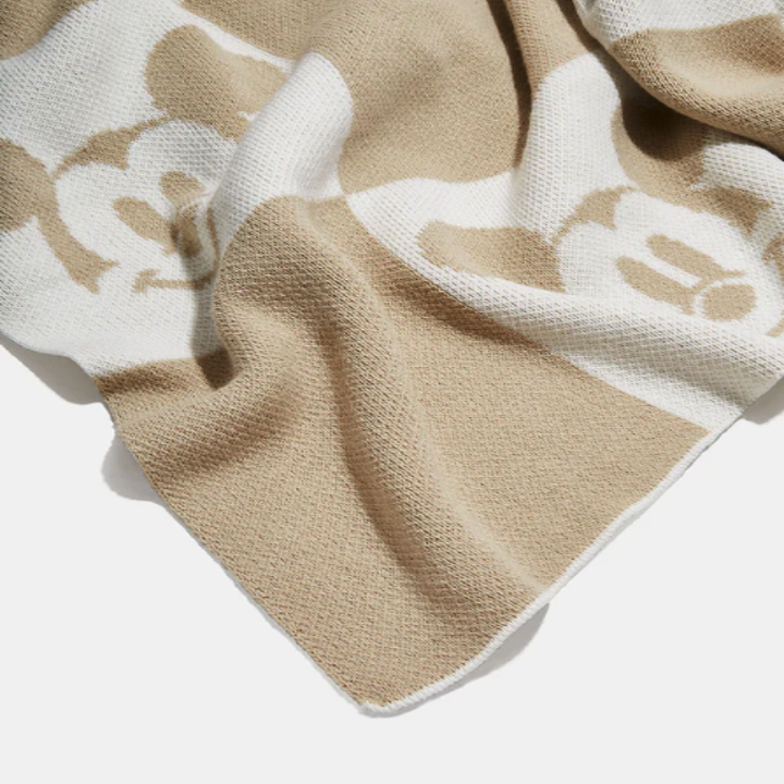 the tan mickey blanket scrunched up