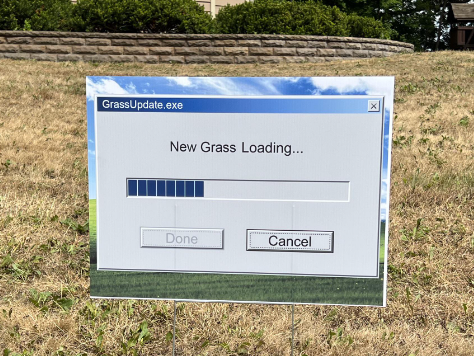 Sign looks like a computer download that reads, &quot;New grass loading...&quot;