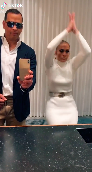 Alex Rodriguez and Jennifer Lopez doing a TikTok challenge