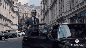 James Bond gets out of a car