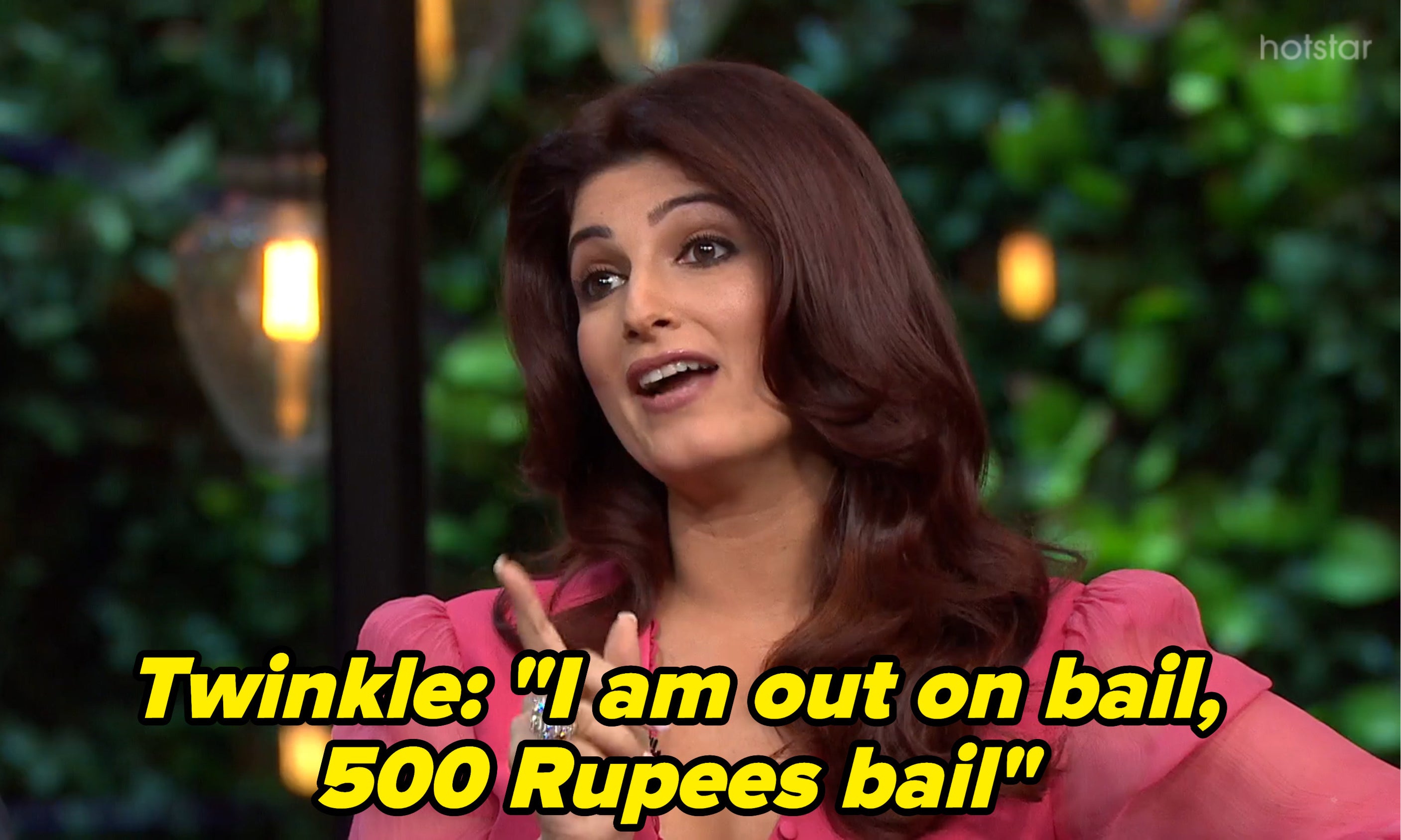 Twinkle Khanna speaking with her finger pointed up