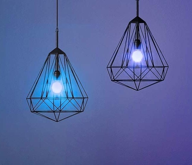 a pair of colour-changing bulbs inside lampshades