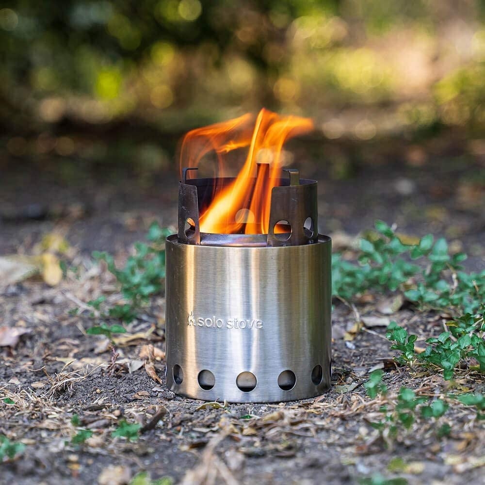 a camping stove on the ground