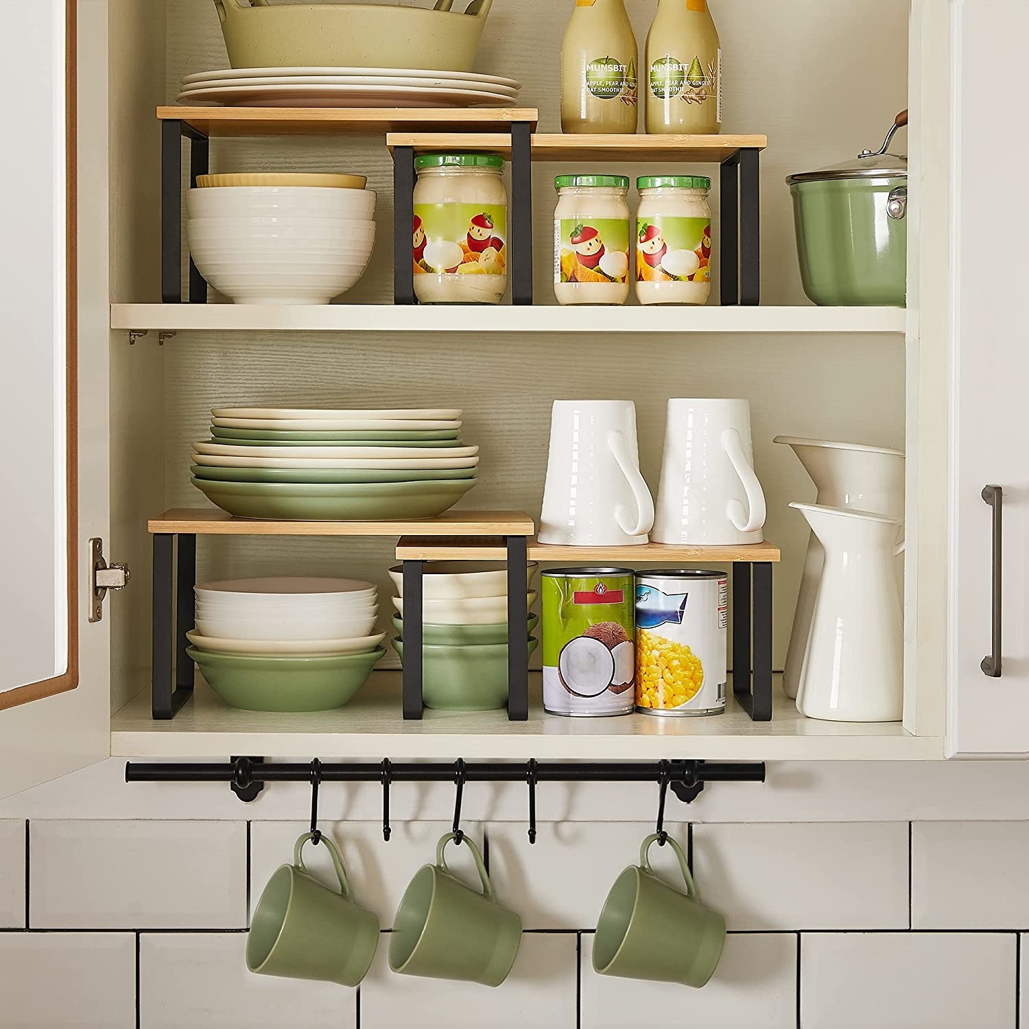 two shelves in a kitchen cupboard