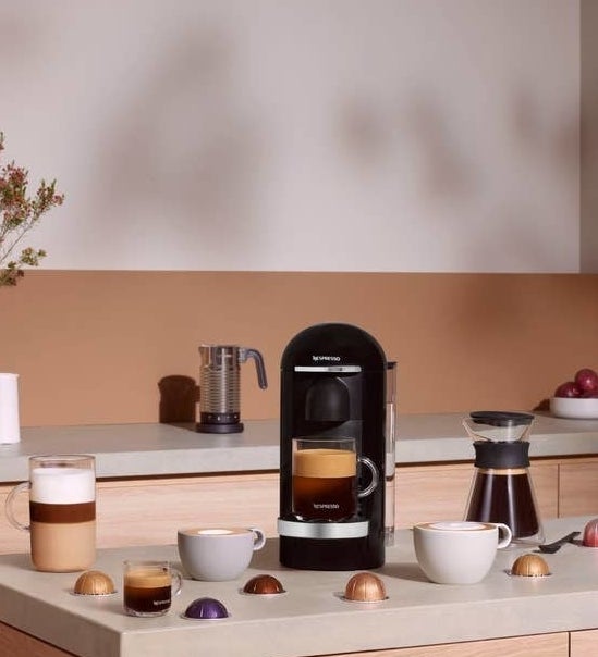 a nespresso machine on a stylish kitchen counter
