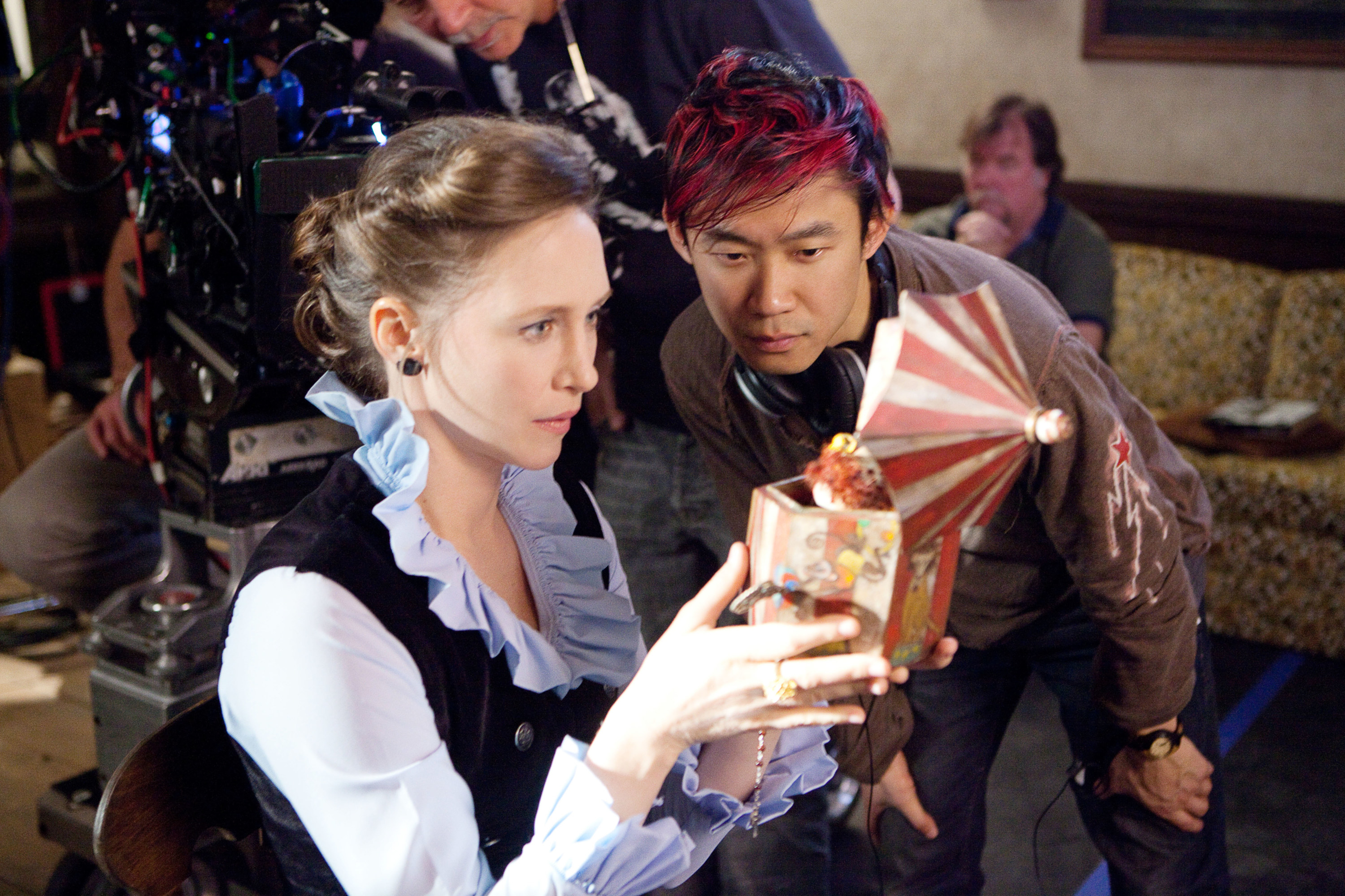 Vera Farmiga, director James Wan, on set