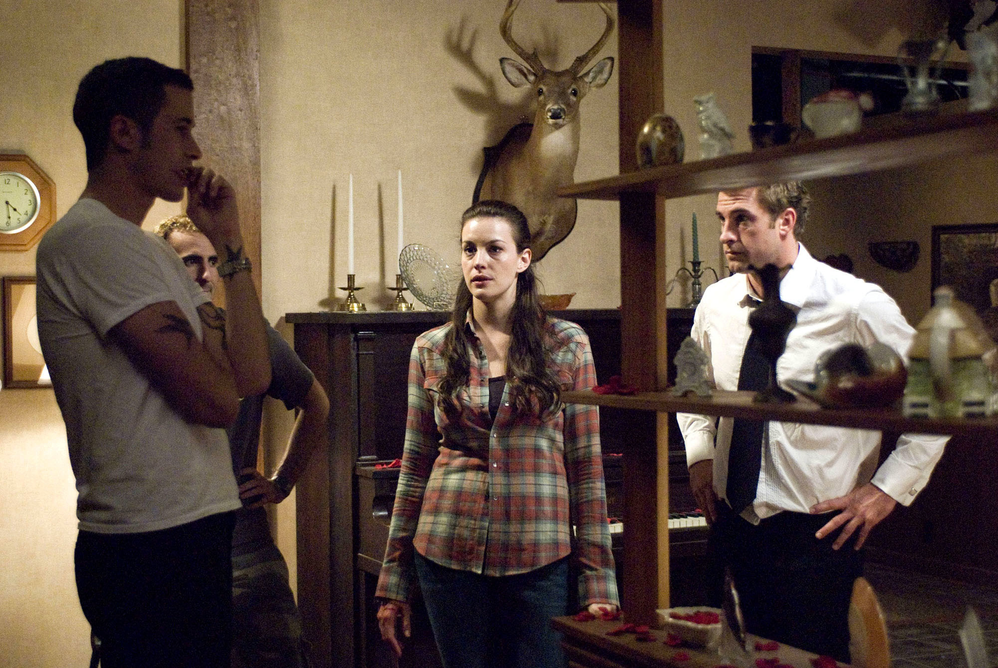 director Bryan Bertino, Liv Tyler, Scott Speedman, on set