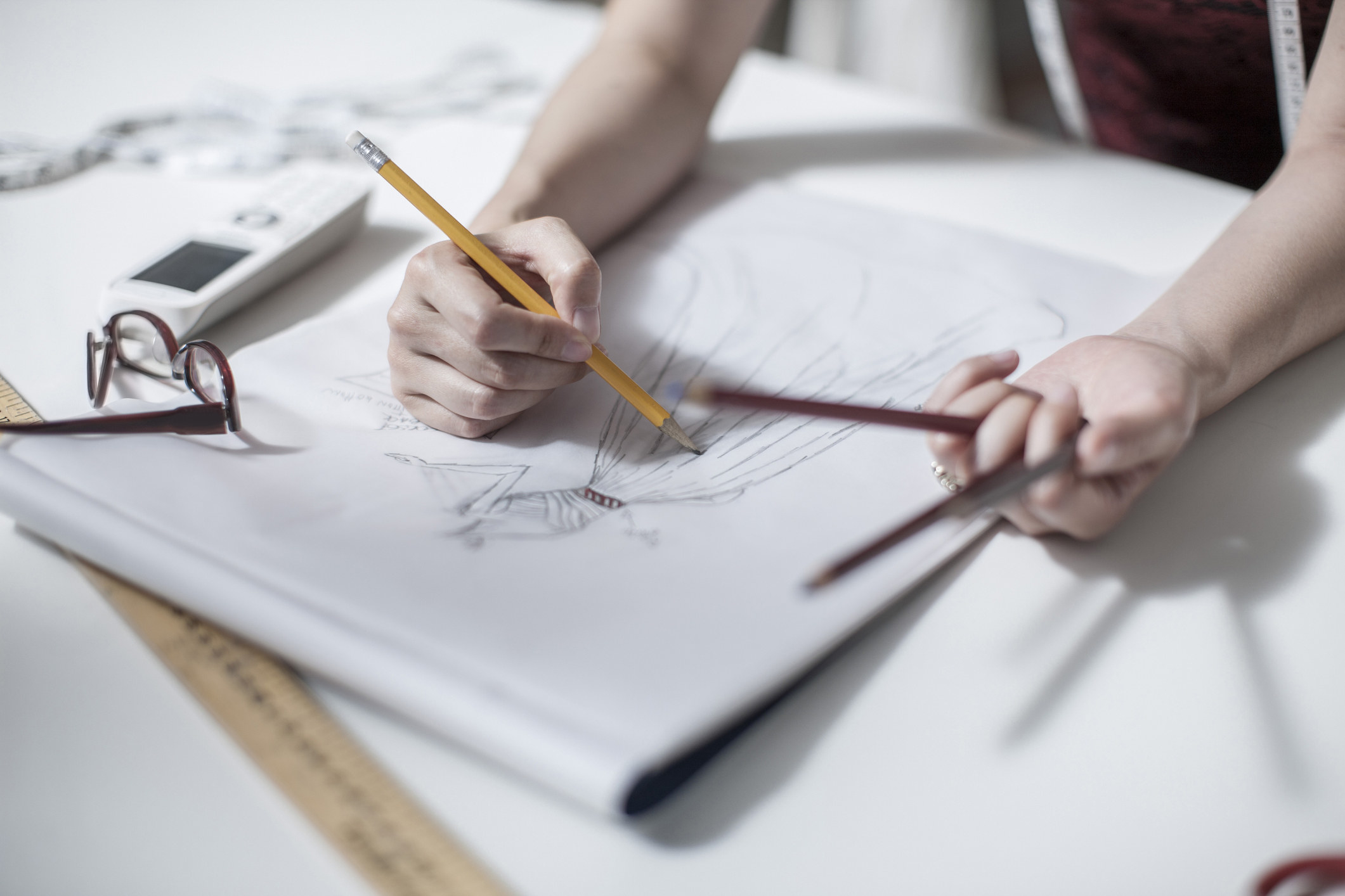 A designer sketching