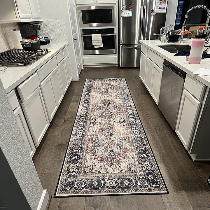 Reviewer's rug runner is shown in a kitchen