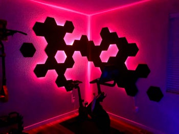 Reviewer's home gym is backlit with red light