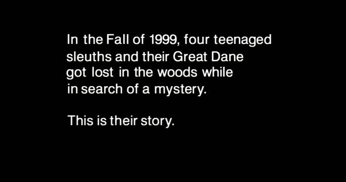 A title card explains that four teenagers and their dog got lost in the woods