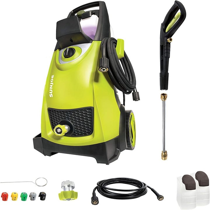 the pressure washer with all of its attachments