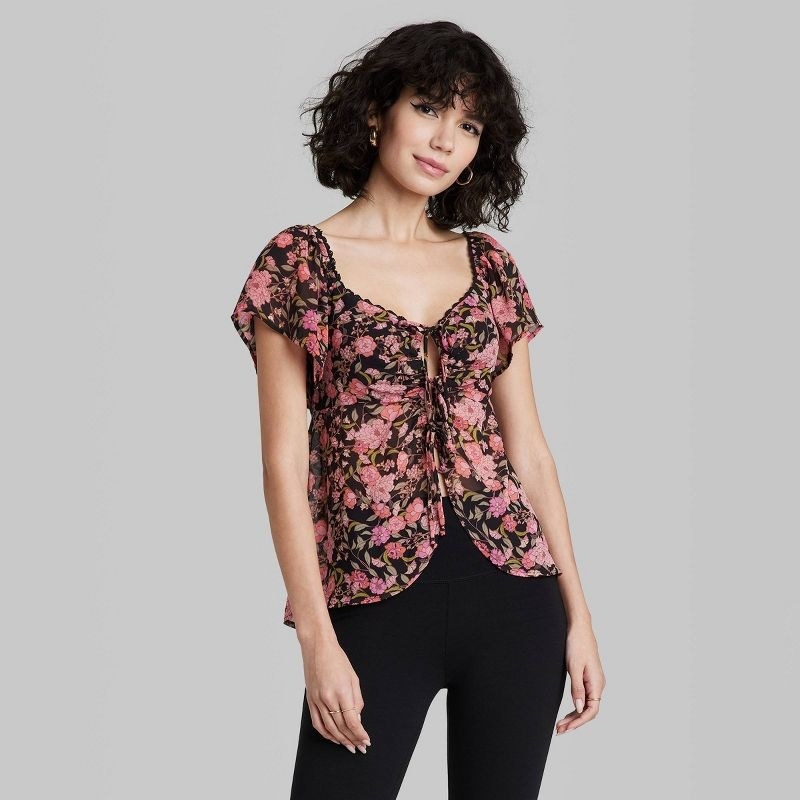 model wearing the floral top