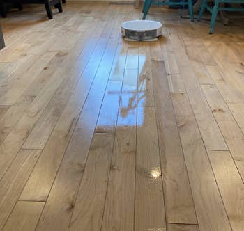 reviewer's clean wood floors after using mop cycle