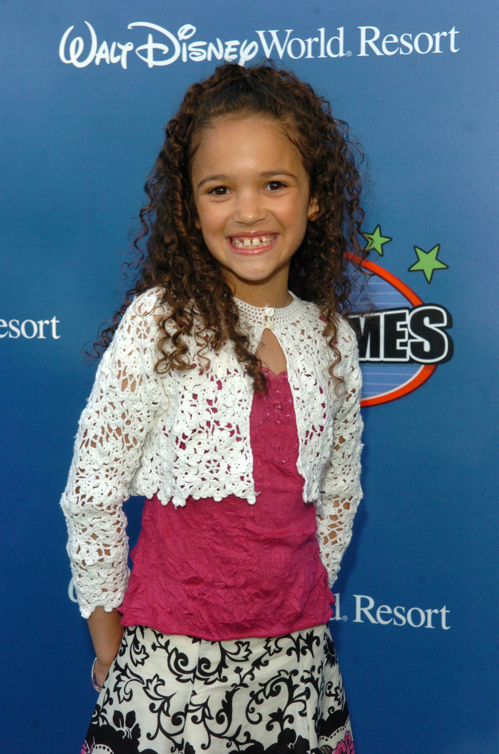 young Madison smiling at an event