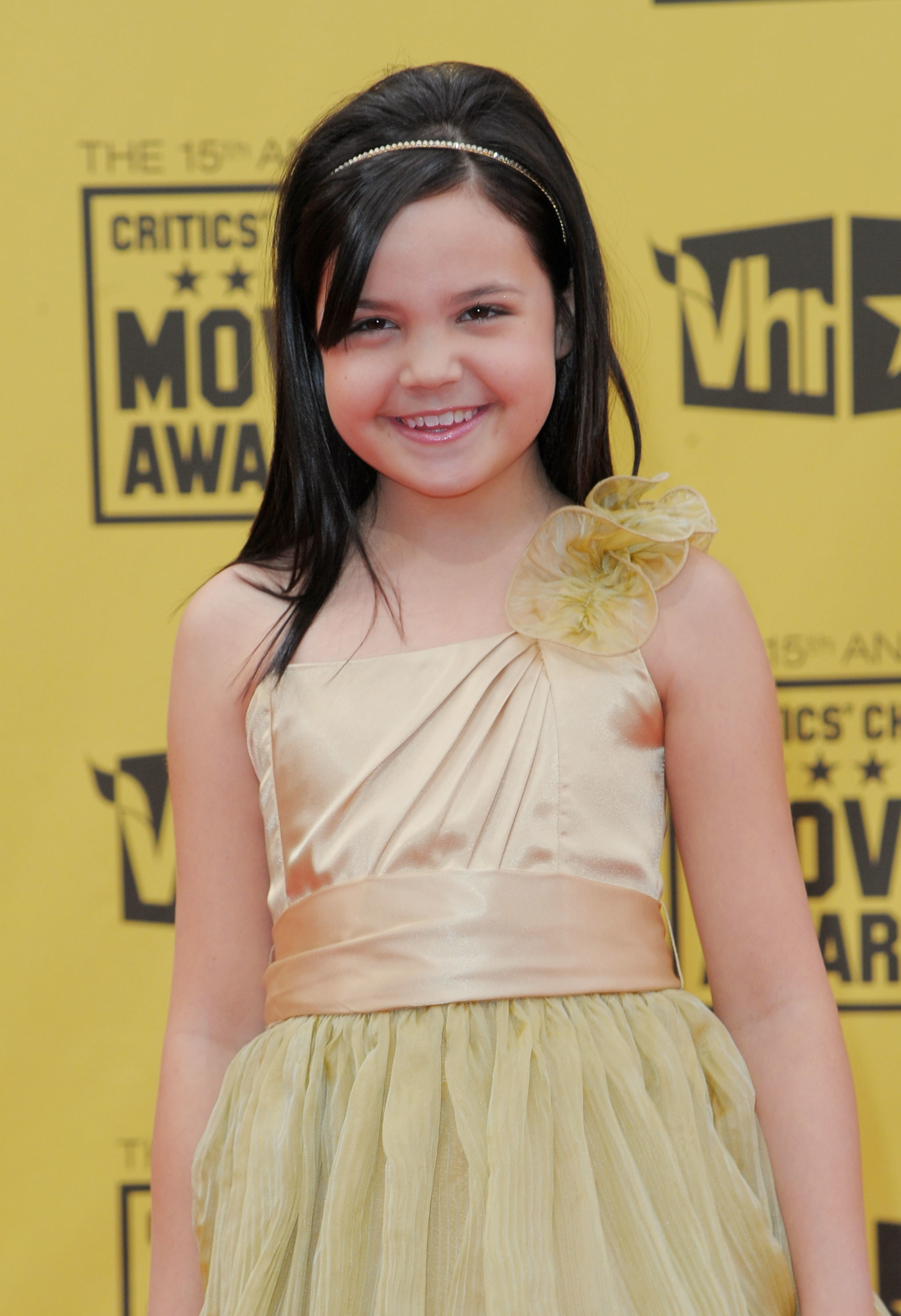 young Bailee smiling in a nice dress