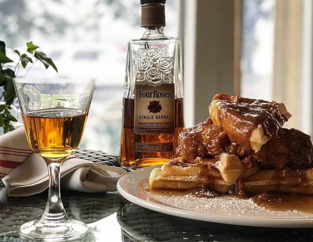 Drink next to sumptuous waffle dish