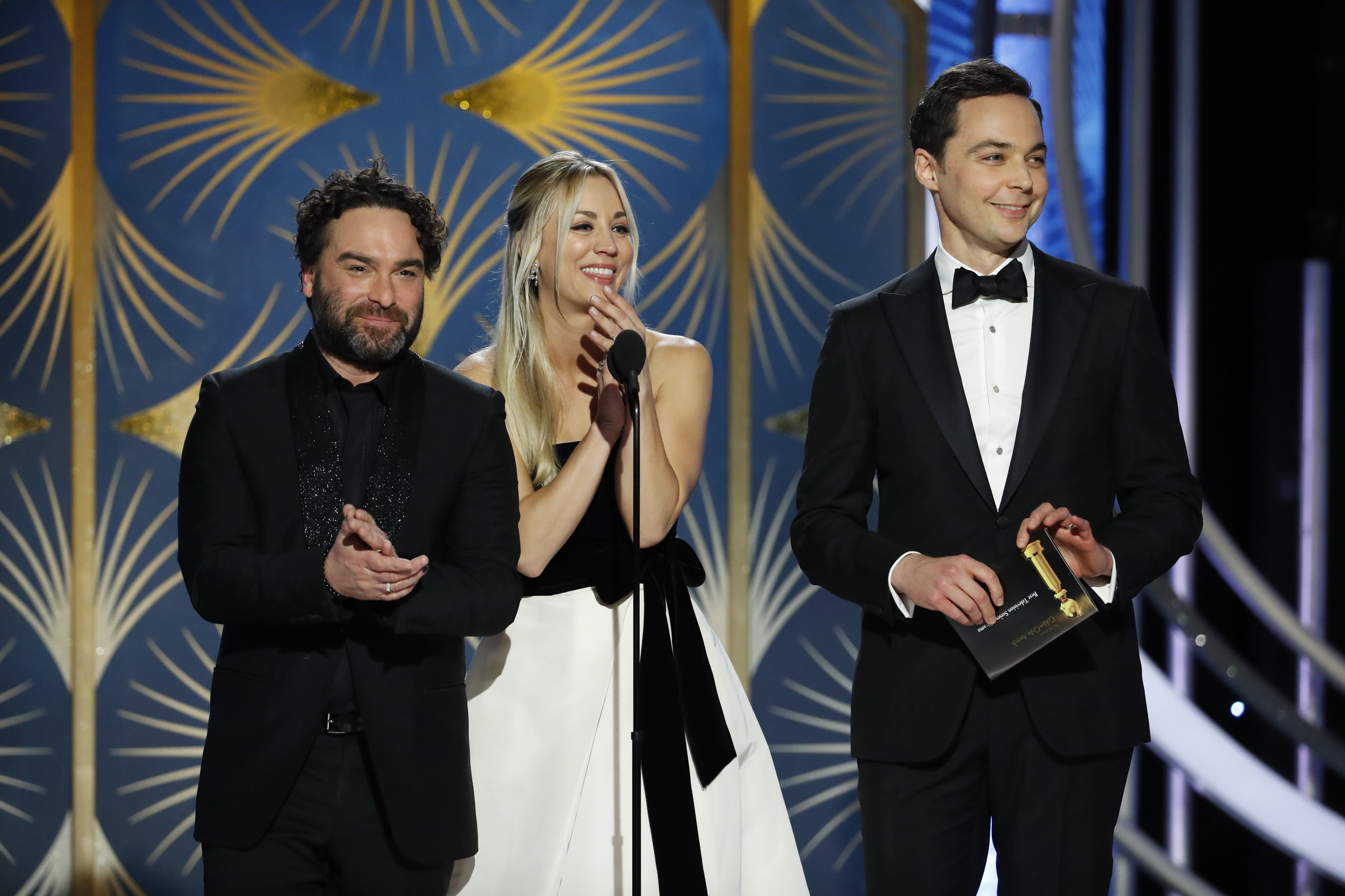 Johnny, Kaley, and Jim presenting an award