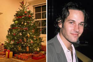 A decorated Christmas tree and Paul Rudd wears a patterned button up shirt under a blazer