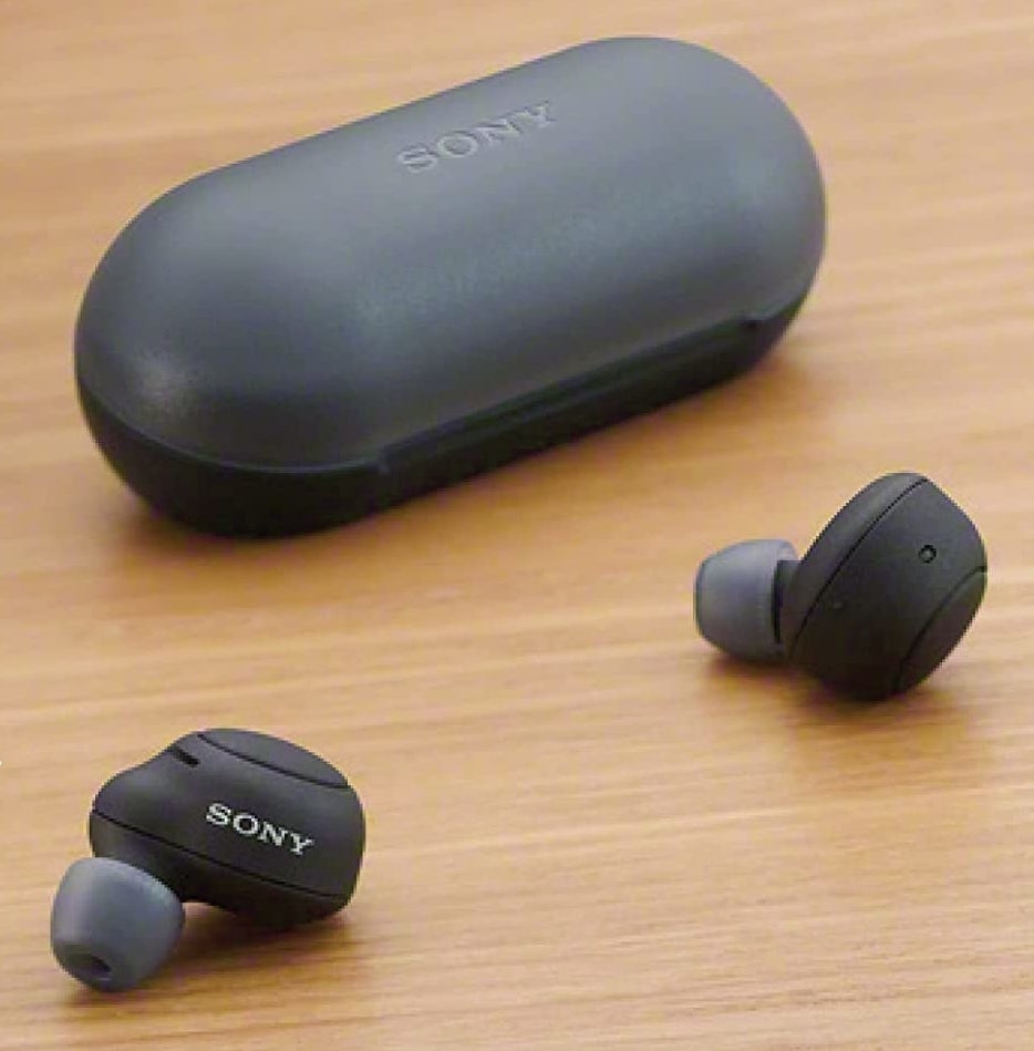 the earbuds next to the case