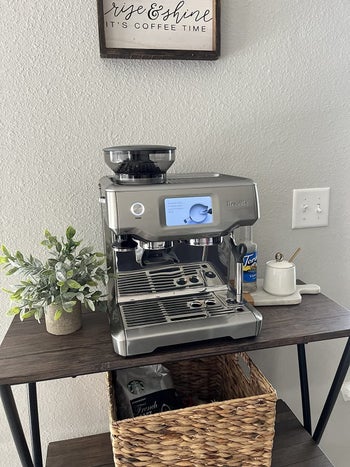 a reviewer's silver espresso machine