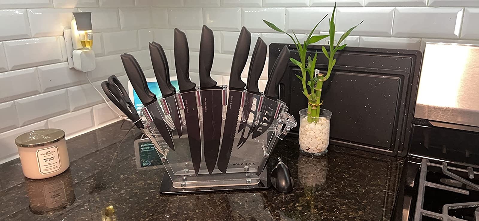 a reviewer photo of the knives sitting on a kitchen counter
