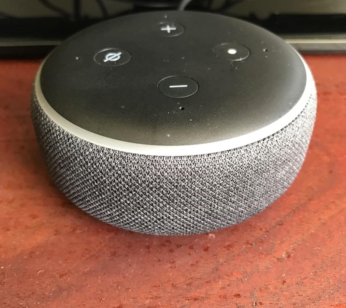 a reviewer photo of the echo dot speaker