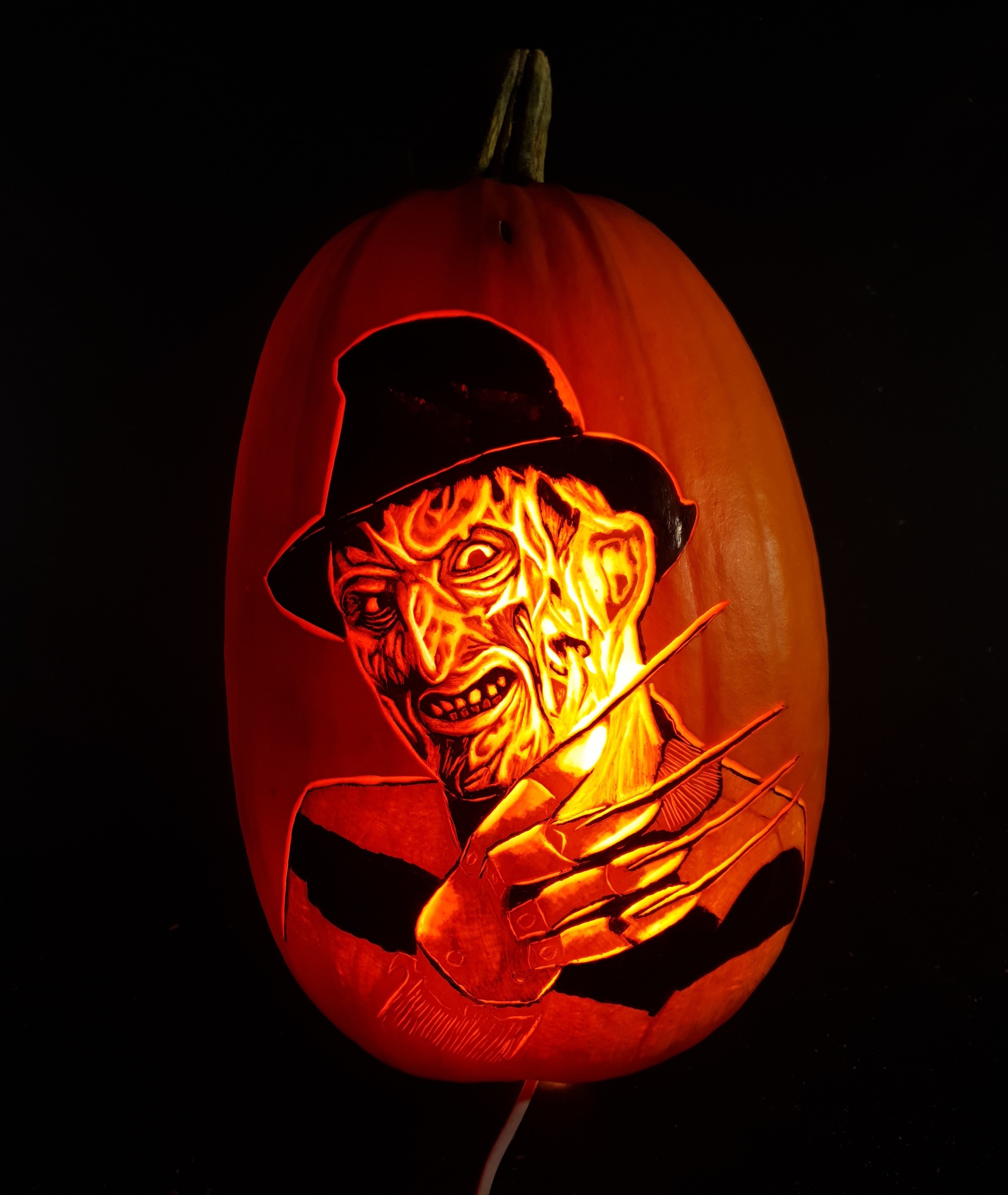 Freddy Krueger carved on a pumpkin