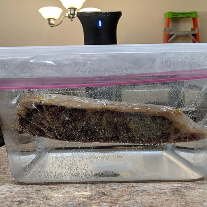 a reviewer photo of the steak cooking with the sous vide