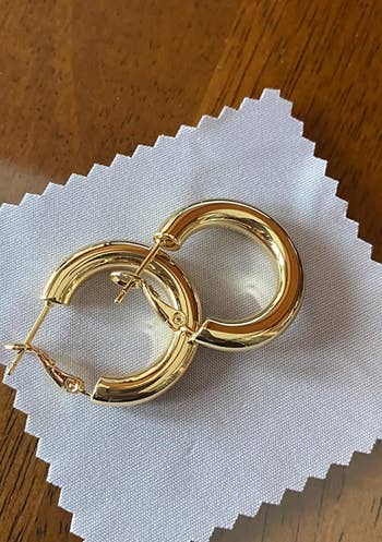 reviewer photo of the gold hoops