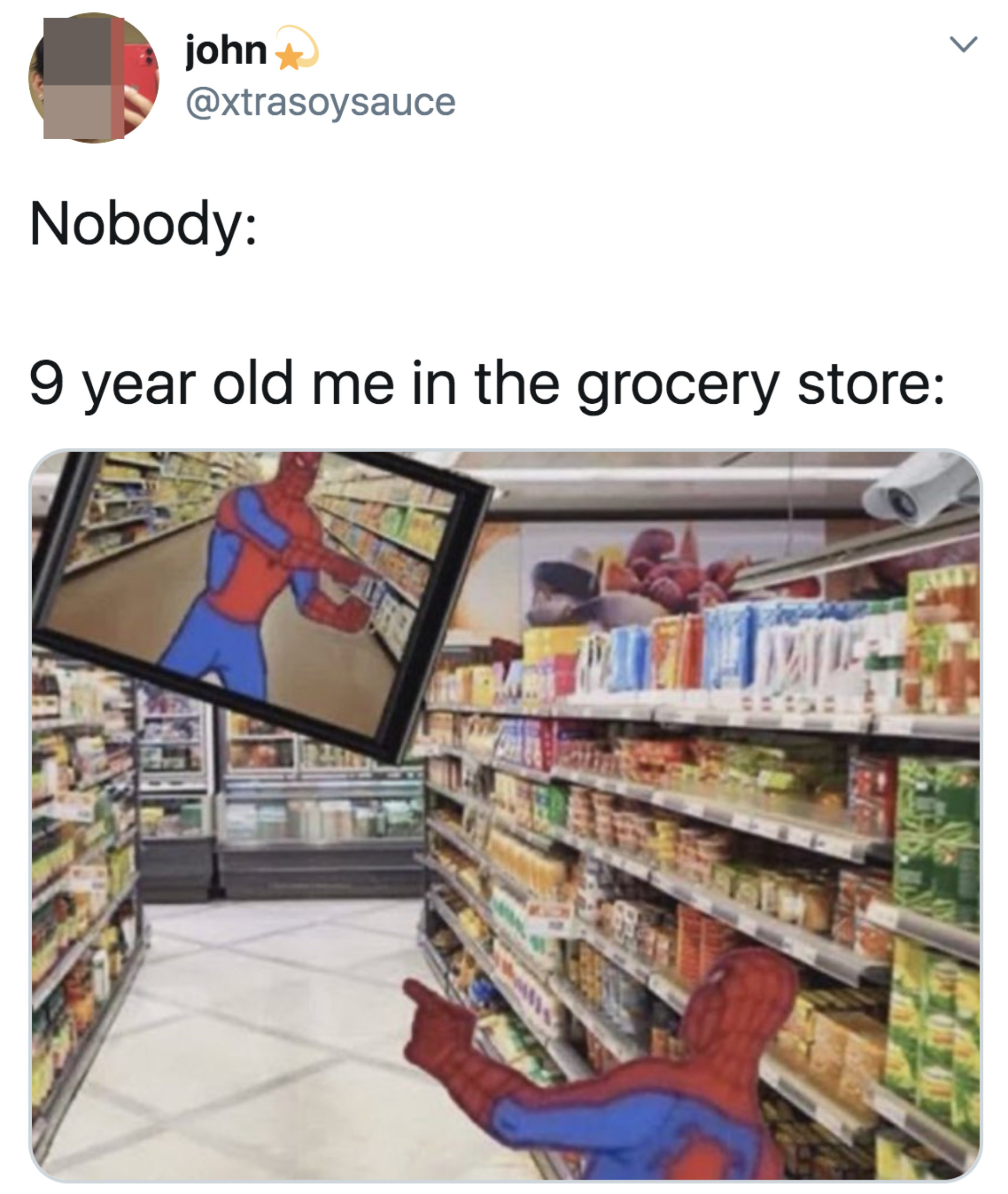 Picture of Spiderman pointing at himself on the CCTV at the grocery store