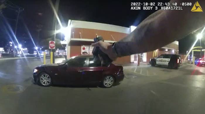 Bodycam footage of the officer pointing his gun at the teen&#x27;s car as it drives away