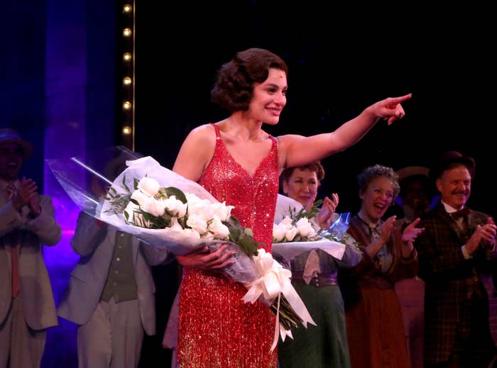 Lea holding flowers onstage after a performance of Funny Girl
