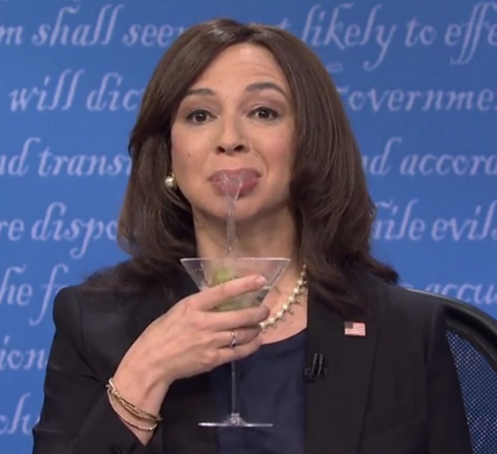 Maya Rudolph spitting into a drink she&#x27;s holding