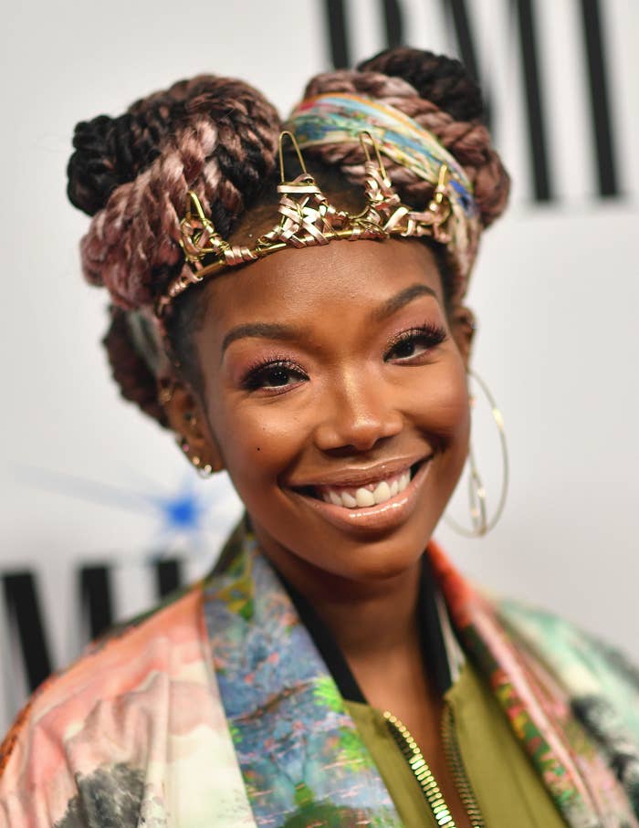 A closeup of Brandy smiling at an event