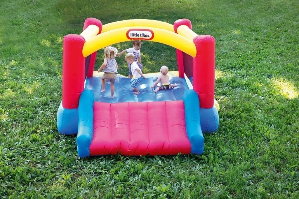 kids playing in a bounce house