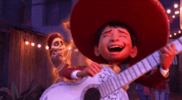 miguel from coco playing guitar
